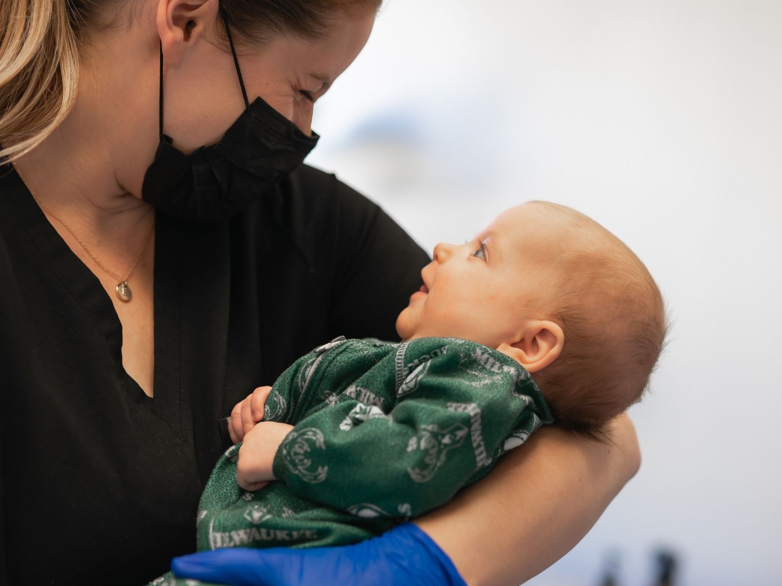 dentist holding a baby