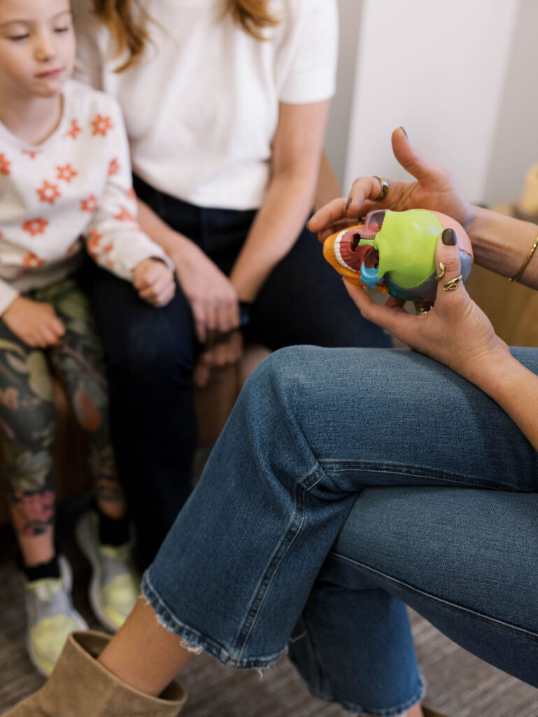 dentist with parent and child